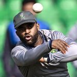 Chess legend Magnus Carlsen puts ‘forbidden jeans’ up for auction